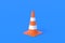 One striped traffic cone, barrier on blue background