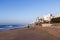 One Surfer on Early Morning Beach in Umhlanga Rocks