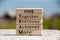 One Team text on wooden blocks with blurred nature background. Business and team work concept