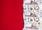 One thousand Ukrainian hryvnia banknotes on a red background 2