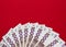 One thousand Ukrainian hryvnia banknotes on a red background 5