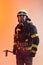 One uniformed firefighter posing against an orange background covered in smoke