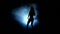 One woman stripper showgirl in silhouette