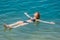 One woman swimming bathing in dead sea jordan