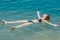 One woman swimming bathing in Dead Sea Jordan