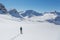 One women with snowshoes in snowy winter landscape near Arosa Switzerland