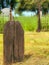 One Wood fence Sticking out of Ground and Blurred Entrance