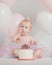 One Year Old Birthday Portraits with smash cake and balloons