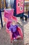 One year toddler girl playing on children playground