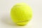 One yellow felt tennis ball