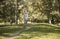 One young man, 20-29 years, riding bicycle in park trail outdoors.eyes closed, enjoying happy