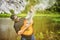 One young man plays the acoustic guitar in nature