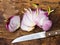 Onion bulb and sliced onions and knife