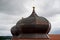 Onion dome with onion helmet or onion dome photographed on a church tower as an architectural roof construction in Bavaria