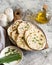 Onion naan - traditional indian bread. pita bread or scones with green onions