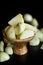 Onion peeled in a wooden bowl