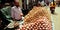 Onion and potato seller at street hand carriage shop