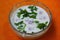 Onion raita in a bowl