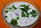 Onion raita in a bowl