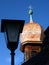 Onion tower with copper top of a medieval wooden church against a blue sky 2