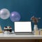 Online birthday party concept with blank screen laptop, cake, party hat and decorations