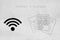 Online business strategy documents next to wifi symbol