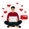 Online communication, separation concept. Aggressive man sitting with laptop with flying broken hearts around