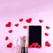 Online congratulations on Valentine's Day. Champagne bottle, wine glass, black tablet or phone screen