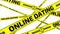 Online dating. Danger. Yellow warning tapes