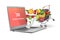 Online delivery of fruits and vegetables. Vegetables and fruits in the cart. Gray laptop.