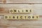 Online Directory word alphabet letters on wooden background