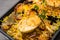 Online Food Delivery - Anda Pulao Or Egg Biryani packed in Plastic box