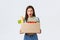 Online home delivery, internet orders and grocery shopping concept. Mad and frustated woman receive wrong order of