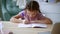 Online home school for junior schoolchildren girl writes Spbd