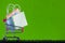 Online market place, eCommerce concept : Shopping cart with shopping bag ready to shop on black keyboard Ordered by customer