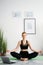 online meditation home yoga peaceful woman laptop