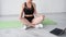 online meditation sportive woman healthy lifestyle