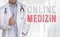 Online Medizin in german online medicine concept and doctor wi