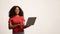 Online Offer. Portrait Of Cheerful Young African American Woman Holding Laptop