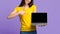 Online Offer. Unrecognizable asian girl pointing at laptop with black screen