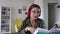 Online old female teacher speaking to camera recording vlog explaining lesson spbi. Web camera