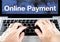 Online payment word on notebook screen with hand type on keyboard, Digital marketing business concept