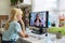 Online session of a teenage girl and a psychologist, social worker
