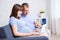 Online shopping concept - pregnant woman and her husband using l