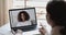 Online teacher or psychologist webcam conferencing with african school girl