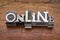 Online word in metal type