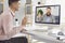 Online work training education video chat call webcam conference. Male businessman speaks works using computer in office