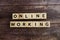 Online Working word alphabet letters on wooden background