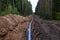 Ð¡onstructing pipelines that transport oil, natural gas, petroleum products and industrial gases. A dug trench in the ground for