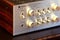 Ontario, Canada - December 22 2017: Vintage Stereo Amplifier Shiny Metal Control Knob Panel Front view